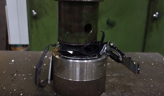 Nikon-Coolpix-P300-camera-getting-crushed-by-a-hydraulic-press-2