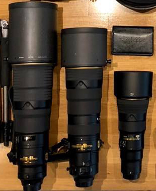 Nikon AF-S NIKKOR 500mm f/5.6E PF ED VR lens next to the 500mm f/4E and