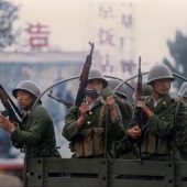 Soldiers patrol a street just east of Tiananmen Square, June 4, 1989. Photo by Terril Jones/AP.