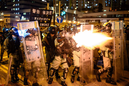 Hong Kong riot police firing tear gas during clashes with protesters, August 2019 / Z6, 35mm, f1.8, ISO 5000