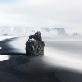 A five minute exposure of the Arnardrangur basalt sea stack looking east along Reynisfjara beach. Nikon D850, 24–70mm at 40mm, ISO 64, 300s at f/10, tripod, BP X4 15-stop ND
