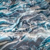 A beautiful heart-shaped ice cave in Svínafellsjökull glacier, viewed from a light aircraft. Nikon D850, 24–70mm at 40mm, ISO 400, 1/800s at f/9