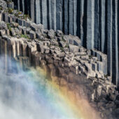 Using spray from the main fall to create some pleasing diagonal symmetry with the basalt columns. Nikon D810, 70–200mm at 200mm, ISO 450, 1/1000s at f/2.8.